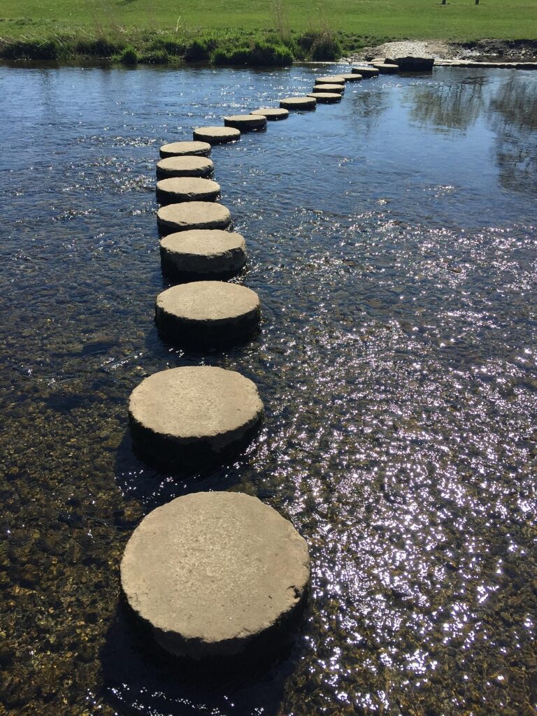 Stepping stones across a river.
